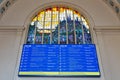 Luxembourg railway station with information panel and stained-glass window