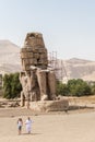 Ancient statue of Colossi of Memnon on the west bank of the Nile, Luxor, Egypt Royalty Free Stock Photo