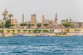 Karnak temple with obelisk and the Muslim mosque on the banks of the river Nile in Luxor, Egypt Royalty Free Stock Photo