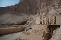 Queen Hatshepsut mortuary temple and the red cliffs of the western bank of the Nile river
