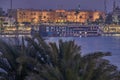 Luxor ,Egypt night shot from west bank showing Nile river with Winter palace hotel in East bank