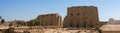 Luxor, Egypt - October 3, 2021: Panoramic view of the Karnak Temple - the temple complex of ancient Egypt. People walk through the