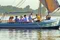 Unidentified people on an excursion on the Nile River in felucca traditional wooden sailing boat, Luxor, Egypt Royalty Free Stock Photo