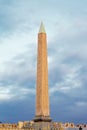 Luxor obelisk on a cloudy sky, France