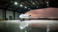 Luxorious Business Jet in Hangar Royalty Free Stock Photo
