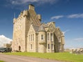 Luxuary hotel of Ackergill Tower at Sinclair Bay in the Scottish Highlands Royalty Free Stock Photo