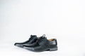 Luxuary man leather black shoe on the white isolation backtground