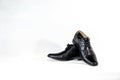 Luxuary man leather black shoe on the white isolation backtground