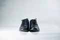 Luxuary man leather black shoe on the white isolation backtground