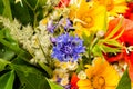 Luxuriant summer bouquet of wildflowers with poppies, daisies, cornflowers closeup.