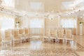 Luxurious antique classic light interior with chairs and windows. Royal Hall Vintage Hall