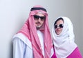 Luxurious arabian couple posing