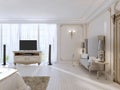 Luxurious bedroom with a large sofa and TV unit the large window
