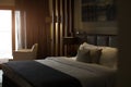 Luxurious bedroom with two towels on the bed Royalty Free Stock Photo