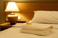 Luxurious bedroom with two towels and shampoo Royalty Free Stock Photo
