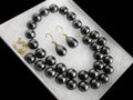 Luxurious black pearl necklace earrings jewelry set choker Royalty Free Stock Photo