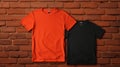 Luxurious Black T-shirts On Brick Wall Mockup Royalty Free Stock Photo