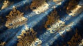 Luxurious blue fabric with ornate golden patterns Royalty Free Stock Photo