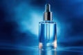 Luxurious Blue Serum Bottle Against Dreamy Soft Blue Background. Royalty Free Stock Photo