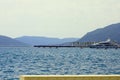 Luxurious boat anchored in a beautiful bay surrounded by mounta Royalty Free Stock Photo