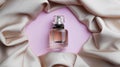 Luxurious bottle of perfume and beige silk on pink background, top view