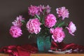 Luxurious bouquet of pink peonies and cherry