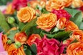 Luxurious bouquet of red and orange beautiful roses. Close-up. Top view. Holidays and celebration Royalty Free Stock Photo