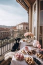 Luxurious breakfast on a balcony in a beautiful city. Generative Ai