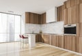 Luxurious bright kitchen interior with elegant furniture inside of spacious residential apartment. Modern concept for design and Royalty Free Stock Photo