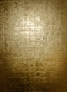 Luxurious burnished gold leaf surface on background panel Royalty Free Stock Photo