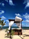 Wooden Cabana with White Sheets on a Caribbean Beach