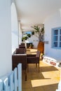 Luxurious cafe seating in traditional Cyclades house Santorini Greece Royalty Free Stock Photo