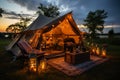 Luxurious camping, glamping, a tent in a clearing on the river bank. Tourism and summer vacation with tents concept.