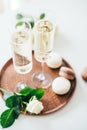 Luxurious champagne wedding party with white roses and macaron d Royalty Free Stock Photo