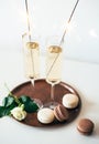 Luxurious champagne wedding party with white roses and macaron d