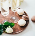 Luxurious champagne wedding party with white roses and macaron d