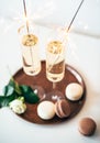 Luxurious champagne wedding party with white roses and macaron d