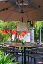 Luxurious Chinese garden restaurant seats and ancient building turret Royalty Free Stock Photo