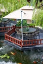 Luxurious Chinese garden restaurant seats and ancient building turret