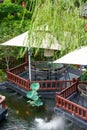 Luxurious Chinese garden restaurant seats and ancient building turret