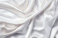 Luxurious closeup of crumpled pure white silk fabric cloth as background with elegant texture design Royalty Free Stock Photo
