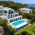 199 A luxurious coastal mansion with panoramic ocean views, infinity pool, and private beach access, offering the epitome of sea Royalty Free Stock Photo