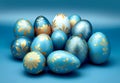 Elegant Blue and Gold Easter Eggs on Gradient Background Royalty Free Stock Photo