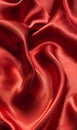 Luxurious crimson silk fabric with subtle sheen, captured in a close-up that highlights its elegant and sumptuous folds.