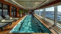 Luxurious cruise ship indoor swimming pool and spa area with sun loungers and exercise equipment. Royalty Free Stock Photo