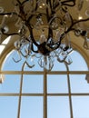 Luxurious crystal chandelier in a room. Royalty Free Stock Photo
