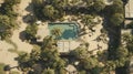 Luxurious Desert Oasis: Aerial Photo Of Pool Surrounded By Trees