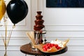 A luxurious dessert buffet with fresh fruit and chocolate fountain