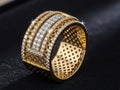 Luxurious diamond ring with gold and black background isolated on white background Royalty Free Stock Photo