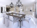 Luxurious dining room with dining table and designer chairs.